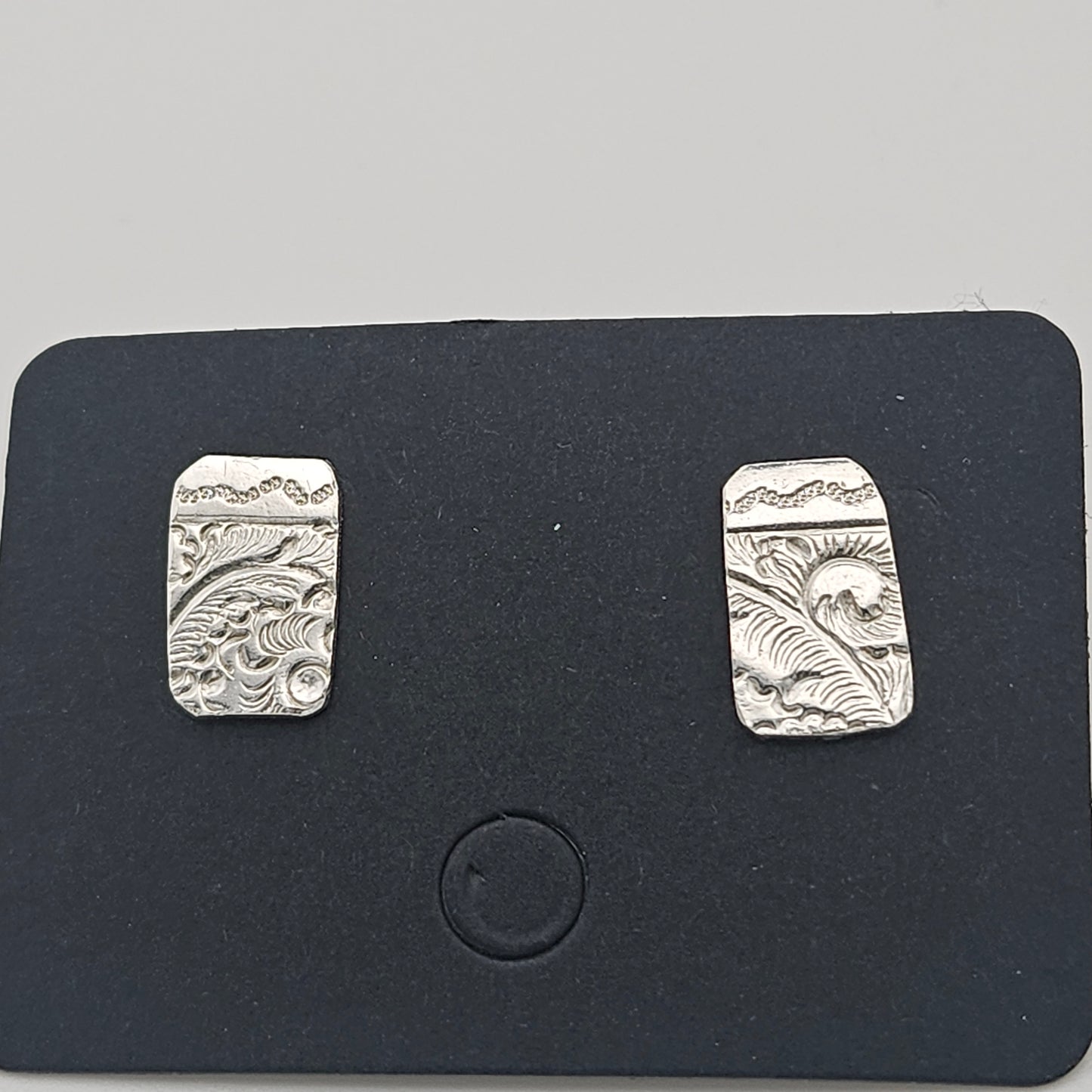 Sterling silver stud earrings. With unique pattern