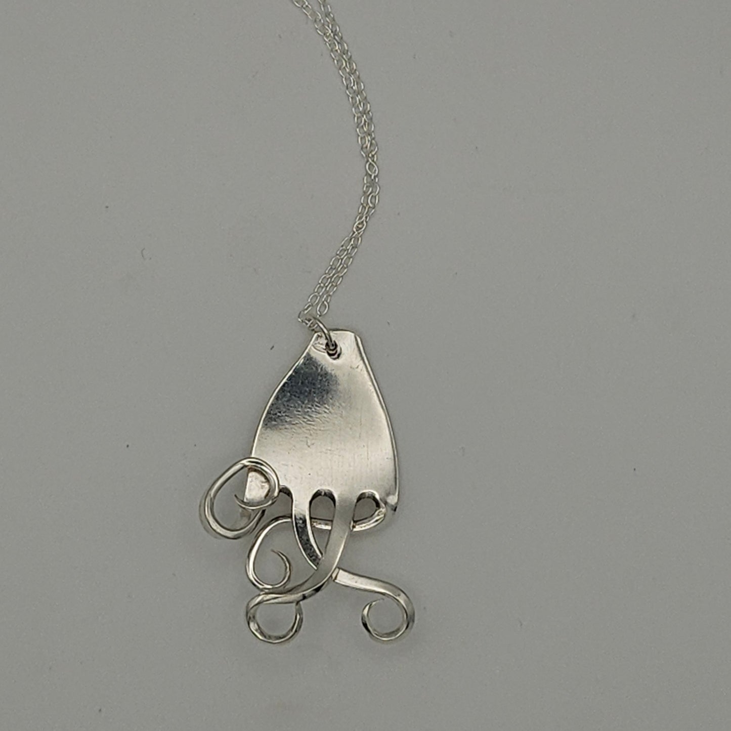 Sterling silver child's fork pendant