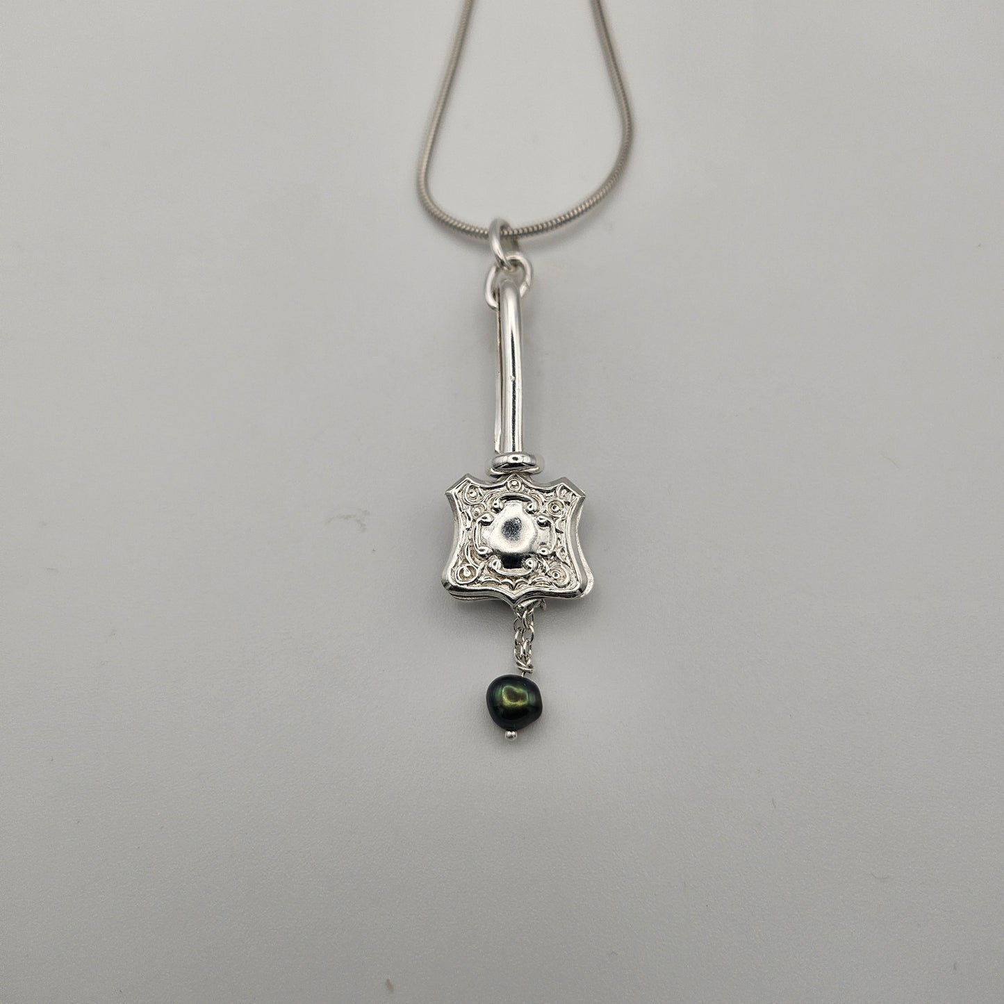 Sterling silver one of a kind pendant. Napkin clip