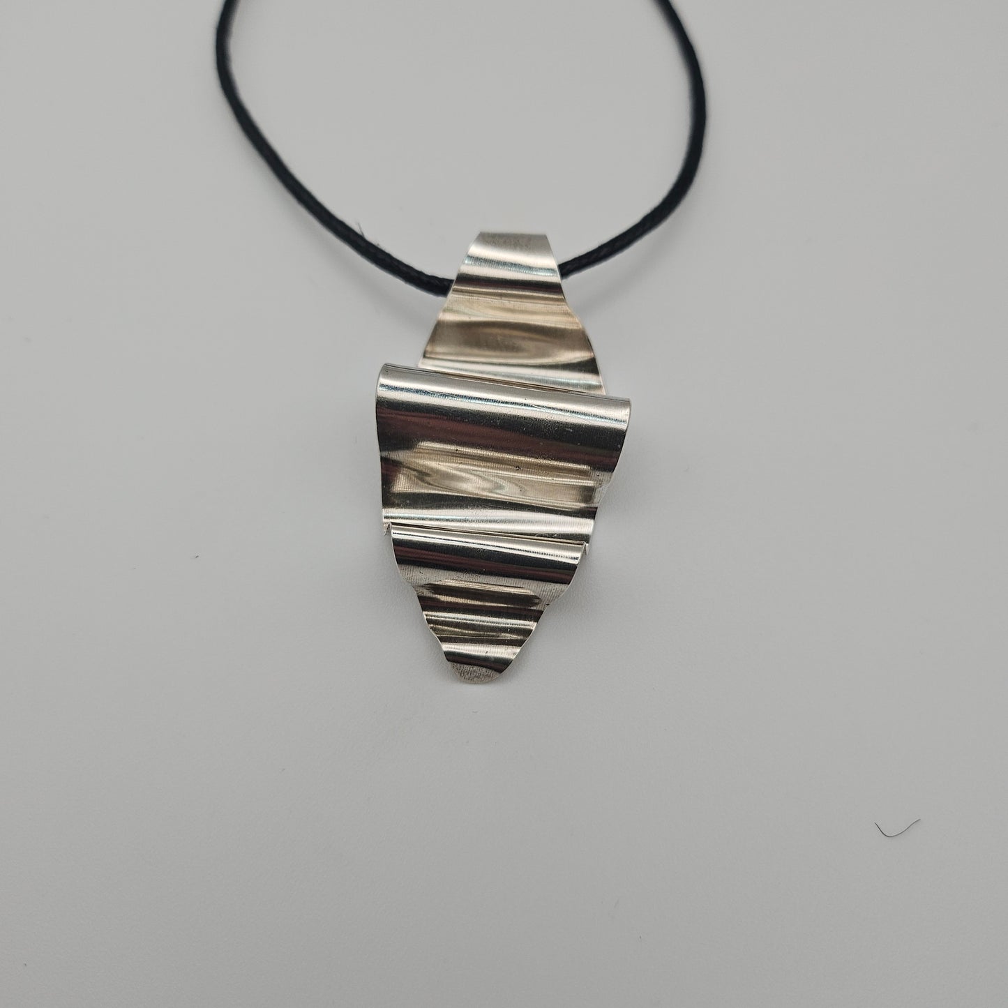 Sterling silver crinkly spoon pendant