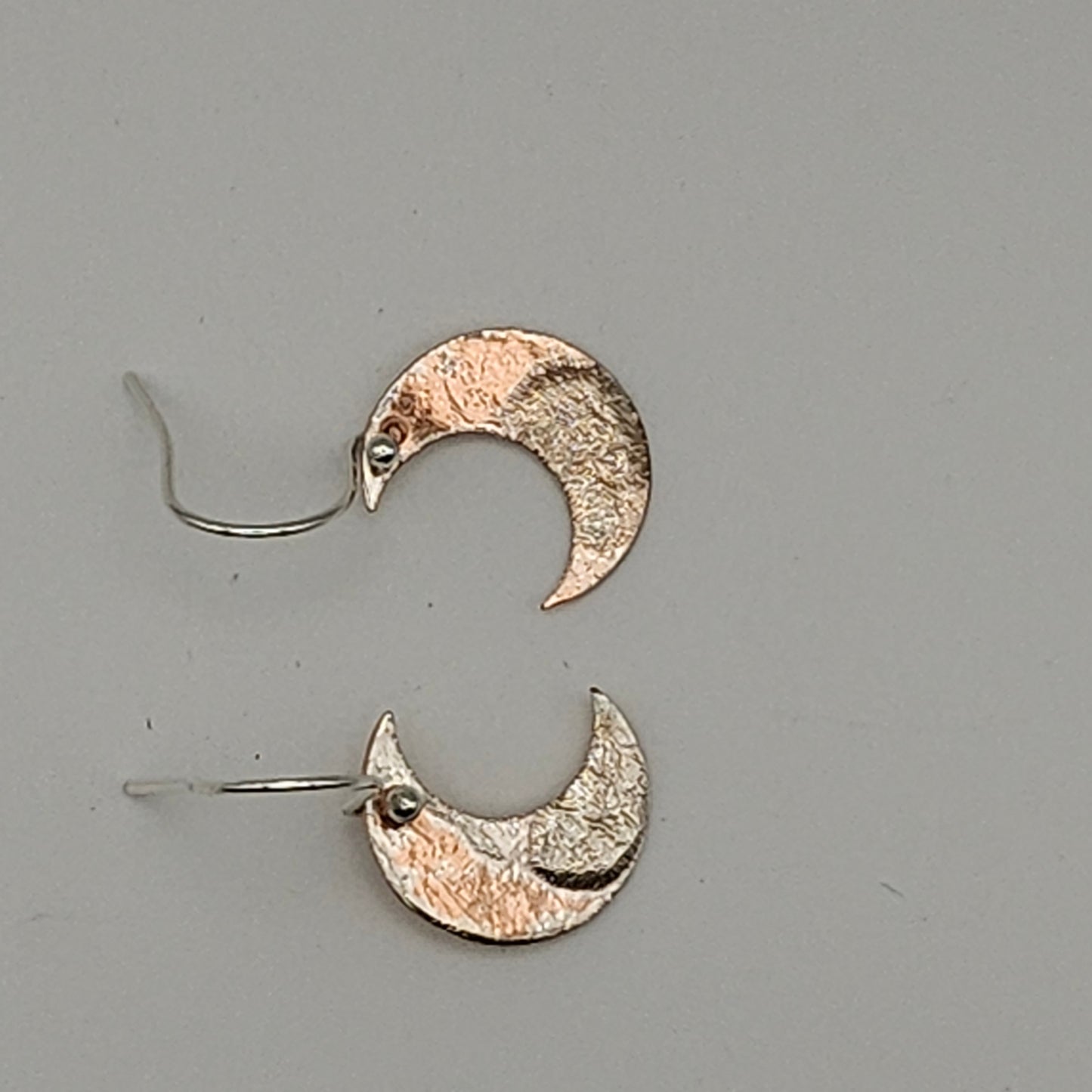 Sterling silver and copper moon earrings