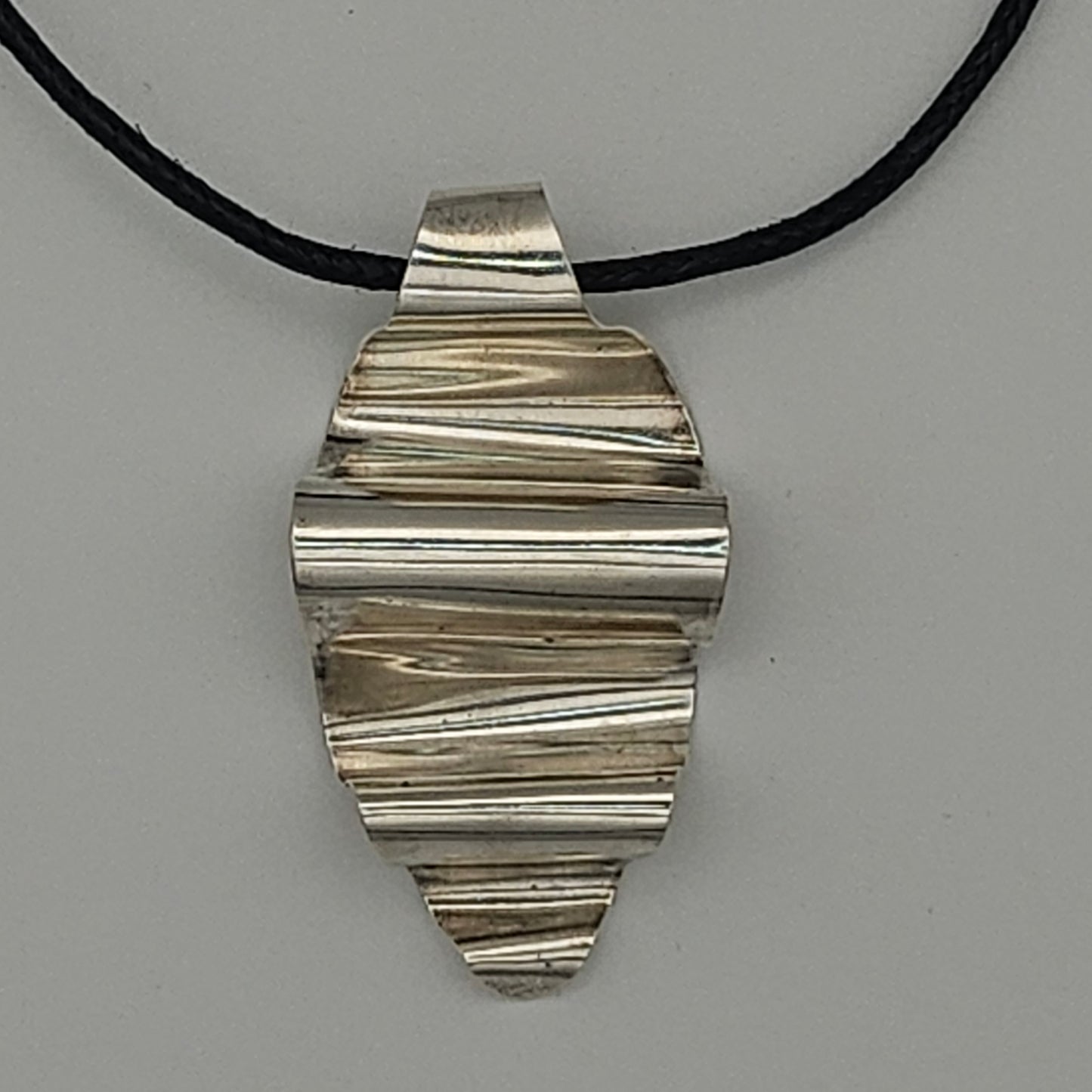 Sterling silver crinkly spoon pendant