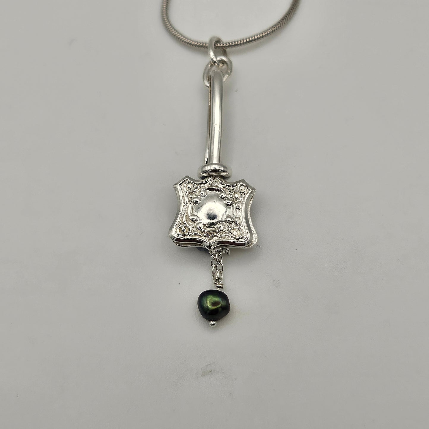 Sterling silver one of a kind pendant. Napkin clip
