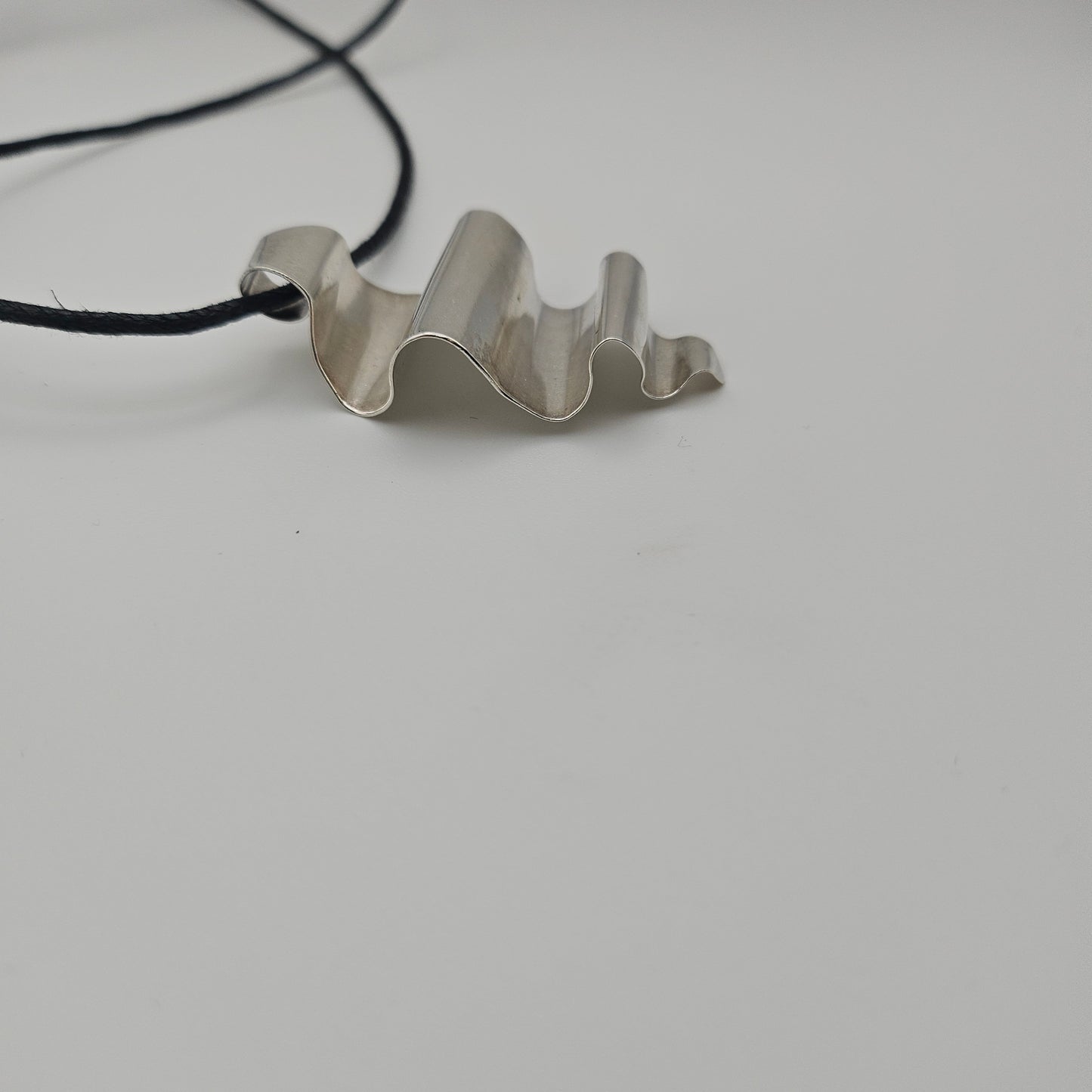 Sterling silver crinkly spoon pendant