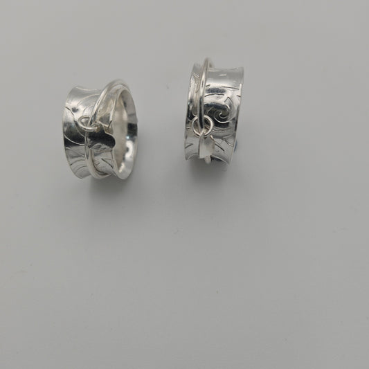 Sterling silver spinner rings. With a heart charm