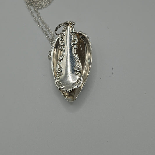 Sterling silver spoon pendant on a long chain
