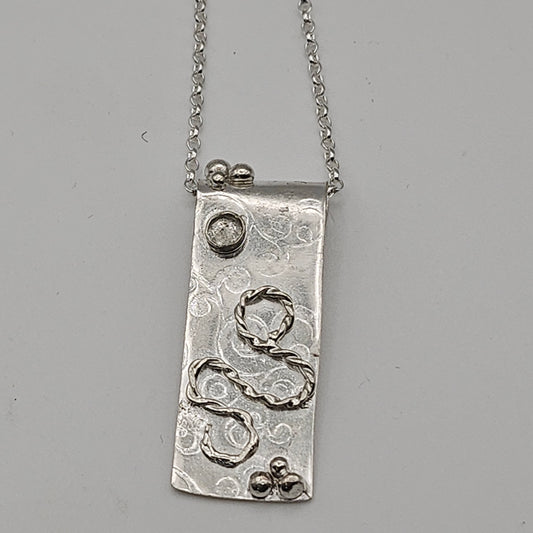 Sterling silver pendant with white topaz stone
