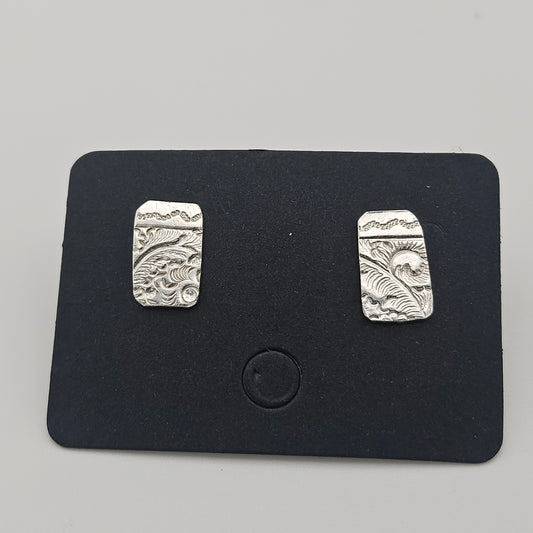 Sterling silver stud earrings. With unique pattern