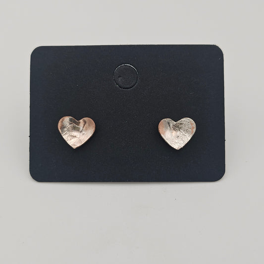 Sterling silver reticulated onto copper.  Love heart studs earrings