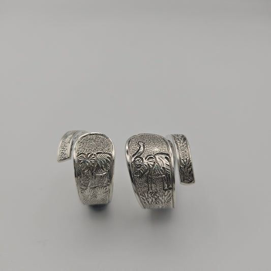 Sterling silver spoon handle spiral rings with elephant designs
